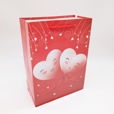 China Wholesale Recyclable Small Gift Paper Bag Heart Design Printing Gift Packaging Bag Jewelry Bag for sale