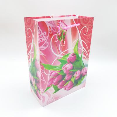 China Recyclable Wholesale Cheap Small Paper Bag Flower Printing Gift Packaging Bag Jewelry Bag for sale