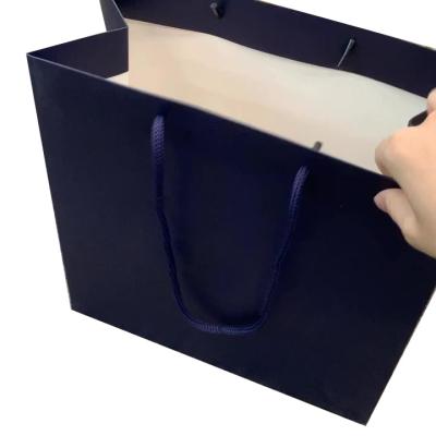 China Recycled Materials Customized High End Shopping Gift Bag Clothing Shoes Packaging Paper Bag Wholesale for sale