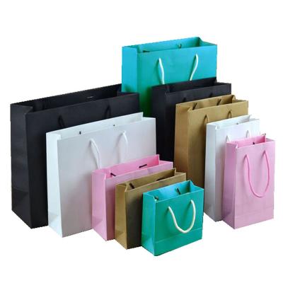 China Recycled Materials Customized High End Brand Specialty Store Paper Bag Retail Paper Bag Boutique Portable Paper Bag Gift Bag for sale