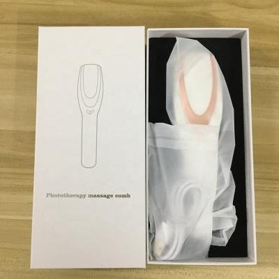 China Hot Selling Vibrating Massage Hair Brush Laser Hair Massager Silicone Electric Infrared Scalp Comb for sale