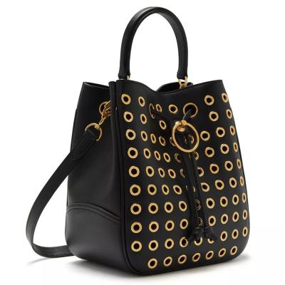 China Custom fashion eyelet vegan ladies designer bucket bag black leather drawstring handbag for women for sale