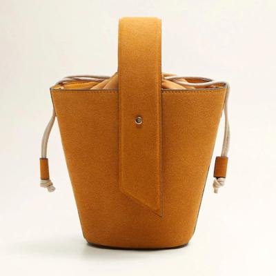 China Custom Round Top Handbag Ladies Fashion Women Suede Drawstring Bucket Bag Female Bucket Tote Bag for sale