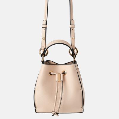 China Custom Faux Pebble PU Leather Small Bucket Handbag Ladies Cross - Body Sling Bag Women Small Bucket Drawstring Handbag for sale