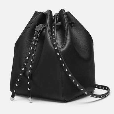 China Custom Faux Bucket Handbag Ladies Black Leather Studded Drawstring Bucket Bag Female Handbag For Women for sale