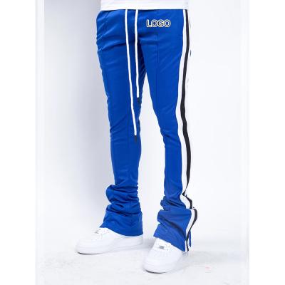 China custom Anti-wrinkle OEM men logo pants apparel cargo pants color block skinny joggersr pants track pants men for sale