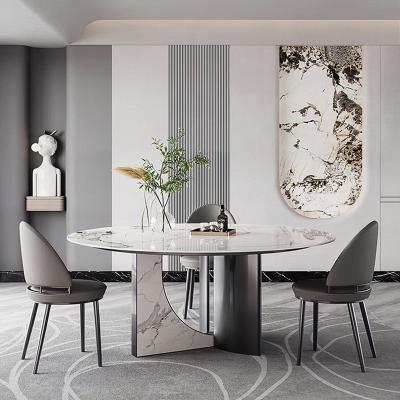 China Modern luxury convertible single dining table and chair combination from Wharton Nordic round table stone marble dining room agglomerate furniture for sale