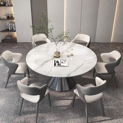 China Convertible Round Customizable Rotary Dining Table Set Stone Slab Countertop Luxury Home Marbled White Chipboard Dining Table for sale