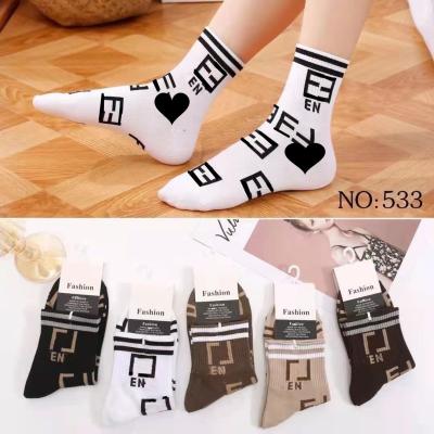 China Sports autumn and winter socks new in the European tube station CIA letter socks couples for sale