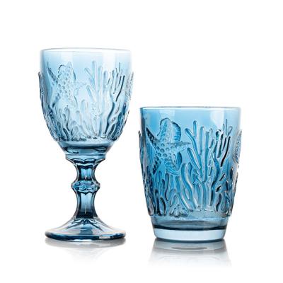 China Old fashion solid color ocean embossed stemware 6oz glassware 6oz juice water tumbler blue glass stemware for sale