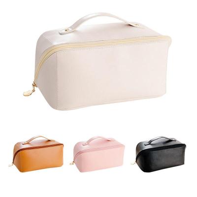 China Portable Customizable Leather Cosmetic Bag Large Capacity Storage Makeup Toiletry Storage Bag Separation Bag for sale