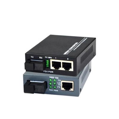 China TP-FTTH FTTB Network Link and Netlink FTTX 10/100/1000 20KM Gigabit 2 Port Fiber Optic Media Converter SC to 2RJ45 Media Converter for sale