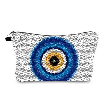 China Hot Sale Fashion Celebrity Evil Eye Cosmetic Bag Devil's Eye Women's Waterproof Bag for sale