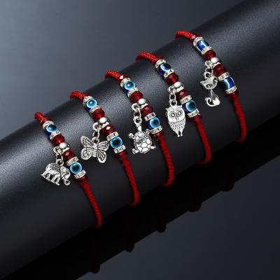 China Cheap Ethnic Woven Evil Eye Bracelet Lucky Nazar Eye Bracelet Animal Charm Braided Protection Against Evil for sale