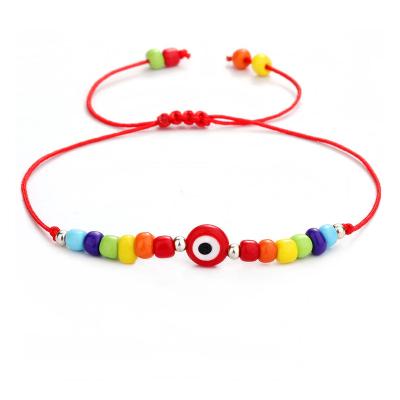 China Cheap Bohemia Ethnic Evil Eye Glass Beaded Woven Colorful Braided Bracelet Rainbow Rope Bracelet Wholesale for sale