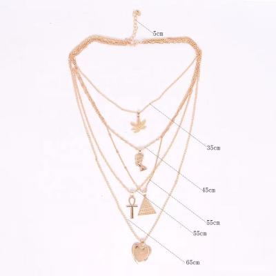 China Peach FASHIONABLE Egyptian Heart Pyramid Empress Pharaoh Leaf Wind Metal Necklace New Pendant Multilayer Necklace For Women for sale