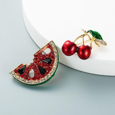 China Cute Women Designer Inspired Wholesale Korean Rhinestone Enamel Brooch Pin Cherry Brooch and Metal Diamond Pins Brooch Hijab Scarf for sale