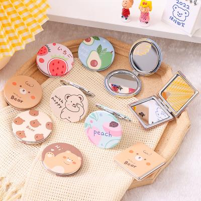 China Mini Daisy Folding Small Portable Cute Double-Sided Double-Sided Mirror Makeup Handheld Round Mirror for sale