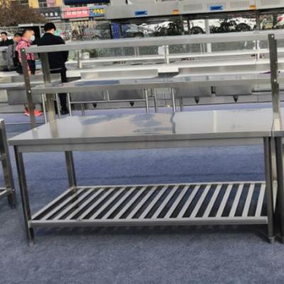 China Easily cleaned kitchen equipment work bench /restaurant stainless steel table /kitchen wort table with top shelf for sale