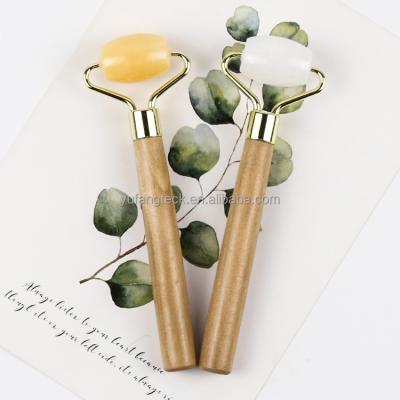 China Whitening Yellow Aventurine Jade Roller Natural Beauty Skin Massage Relaxation Tools Crystal Roller Anti Aging Facial Face Lift Massager for sale