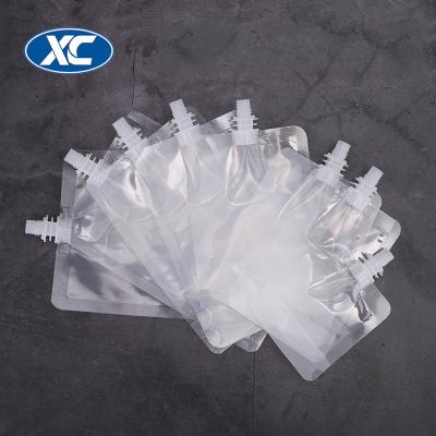 China Simple Portable Reusable Transparent Packaging Plastic Juice Bag With Spout for sale