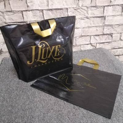 China Popular Design Customized Gift Plastic Biodegradable Plastic Bags Moisture Proof Shopping Bag For Boutiques for sale