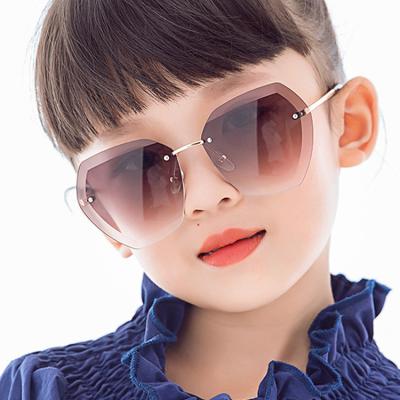 China Colorful Balanced Frameless Polygon Children's Sunglasses Boys And Girls New Fashion Sunglasses Irregular New Fashion Sunglasses for sale