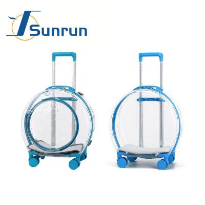 China Two Style Pet Travel Crate Viable Transparent Breathable Pet Crate Outdoor Cage With Cart Wheels Portable Pet Travel Space Capsule for sale