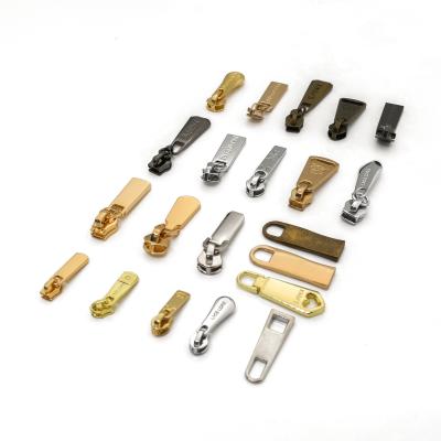 China Custom Metal Accessories Zippers Slider Suitcase Zipper Puller With Logo for sale