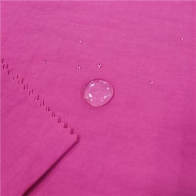 China 288T 100% waterproof anti-liquid waterproof nylon taslan fabric for beach shorts for sale