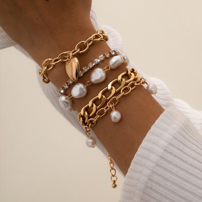 China Fashion Casual/Sporty Women's Fashion Jewelry Vintage Shaped Pearl Vintage Bangle Love Bracelet Set for sale