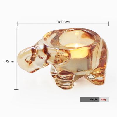 China FengJun Tea Color Shape Elephant Candle Holder Custom Made In Fancy Luxury Amber Iridescent Glass Candle Holders Light Pearlized Glass for sale