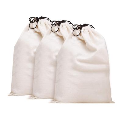 China Various Small Medium Large Handled Cotton Drawstring Bag Custom Classic Pattern White Cotton Storage Drawstring Bag for sale