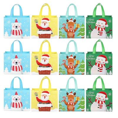 China Snowflake Foldable Portable Christmas Gift Bag Handled Hot Selling Nonwoven Holiday Party Bag for sale