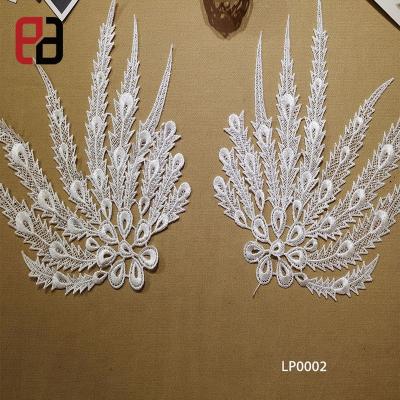 China Water Soluble Ready To Ship Wing Lace Applique Lace Pair Hot Selling Water Soluble Pad for sale