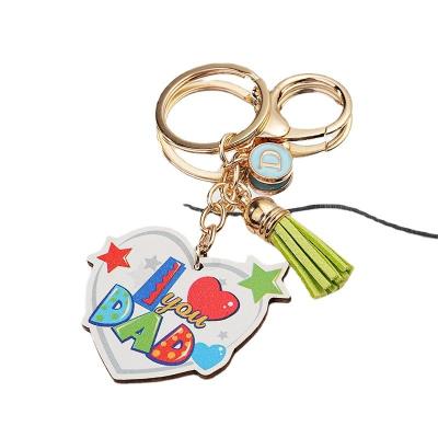 China Durable Promotion of new cartoon English color printing Love Father's Day gift tassels car key chain for sale