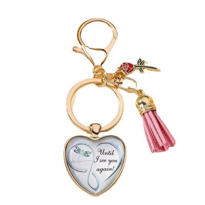 China Durable 2023 Graduation Season Gift Key Chain Time Glass Round Peach Heart Glue Drop Key Ring for sale