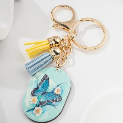 China Durable Hot Sale Promotional Gifts Butterfly Tassels Charm Keychain Multicolor Butterfly Key Chain Accessories for sale