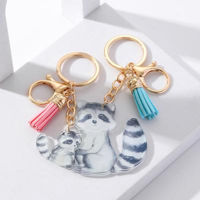 China Modern art Creative imitation wooden lovers otter Keychain pendant Valentine's Day lovers key ring for sale