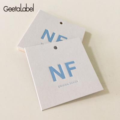 China Sustainable 600g Garment Hang Tags Custom Paper Tags 6.5x6.5cm Hang Tags For Clothing Own Logo for sale