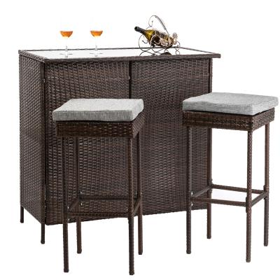 China Modern Outdoor 3-Piece Brown Wicker Bar Set Glass Bar and Two Stools with Cushions for sale