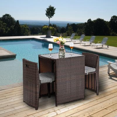 China Modern Design Rattan Wicker Space Saving Bistro With Glass Top Table Chairs for sale