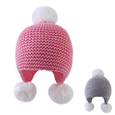 China Image Winter Kids Warm Pom Pom Beanie Hats Earflap Knitted Baby Hats for sale