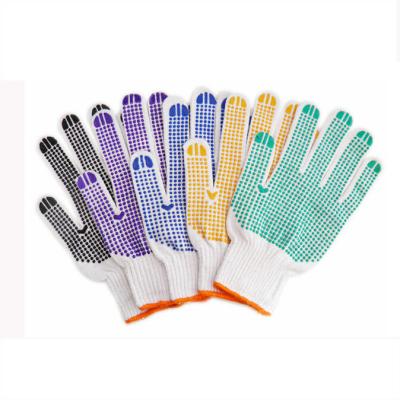 China Comfortable seamless PVC glove with PVC dots for sale