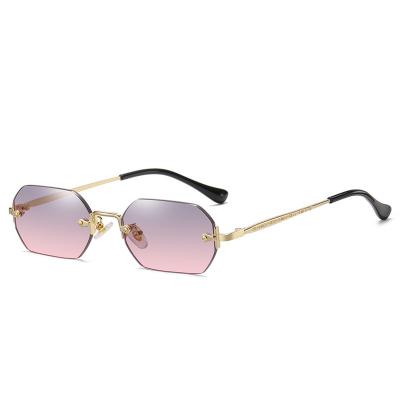 China Fashion Sunglasses Stylish Small Frame Polygon Metal Rimless Sunglasses for sale