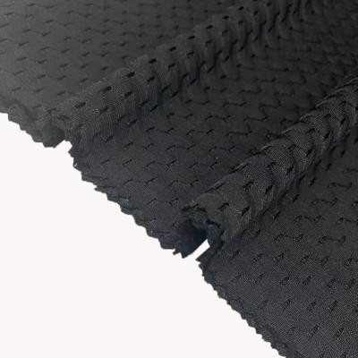 China Blackout Recycle Nylon Spandex 4 Way Hexagonal Elastane Eyelet Stretch Sports Mesh Fabric for sale