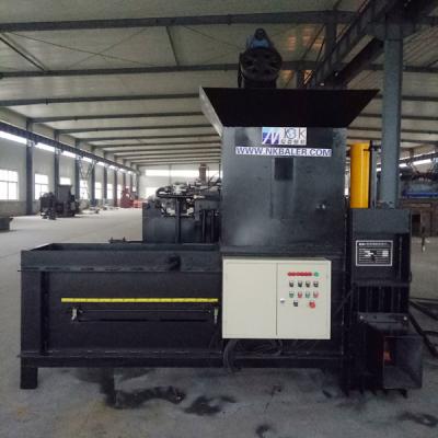 China sawdust baler banding machine,rice husk sawdust bale strapping machine for sale