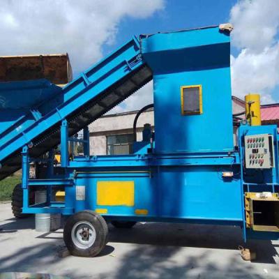 China sawdust hydraulic packing machine,sawdust double bucket bailing machine for sale