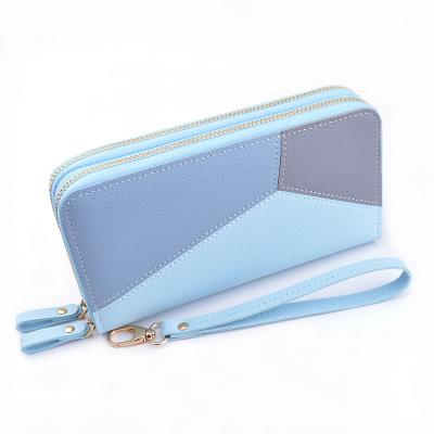 China 2021 hot sale custom logo raincoats and fashion multifunctional elegant multicolor long women's wallets for sale