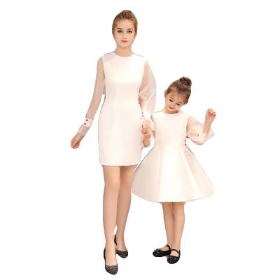 China Lovely Viable White Bow Parent Child Clothing Stage Show Costumes Mother Daughter Dress Parent Child Clothes Te koop